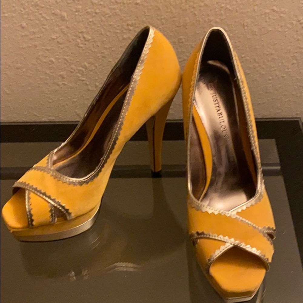 Yellow suede stilettos